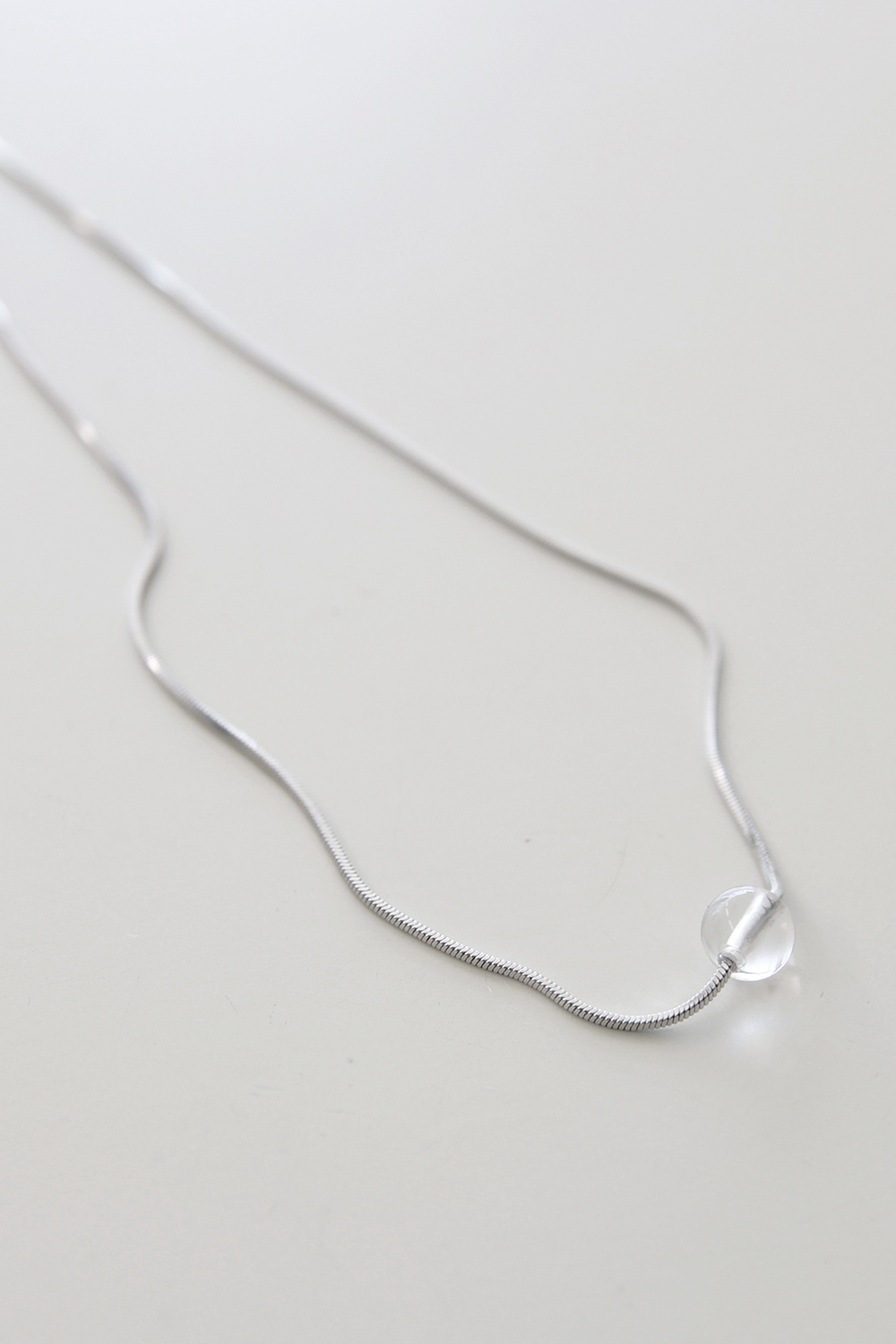 CLEAR BALL NECKLACE